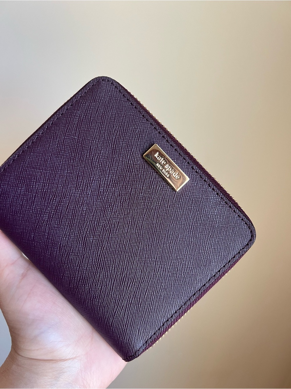 kate spade textured zip wallet in plum
